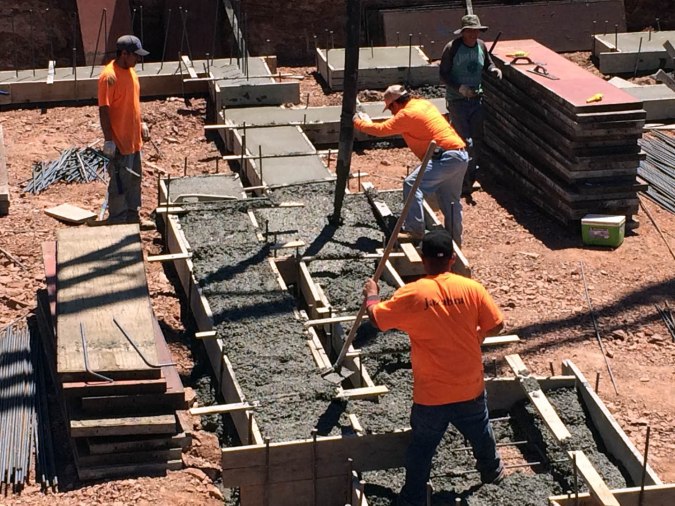 Concrete crew working hard.