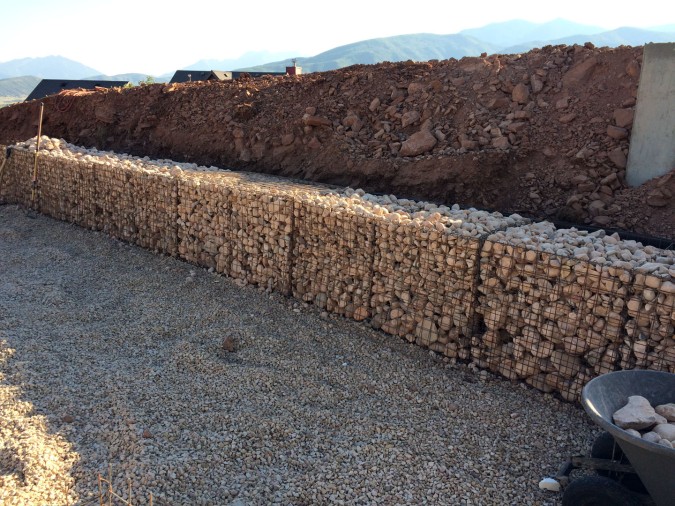 Gabions on the west side of the drive...a little too full, we'll need to take a few out.